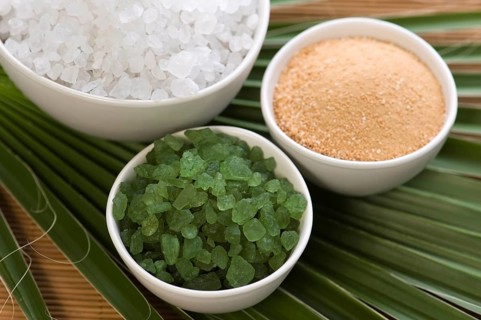 Bath salt and palm leaf