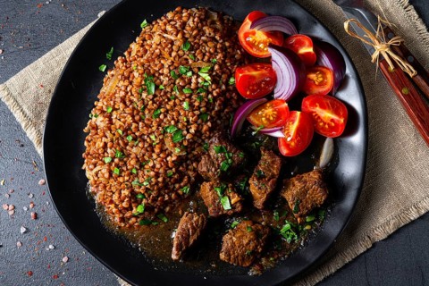 Buckwheat oats baked in the oven with beef goulash