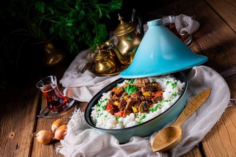 Tajin beef stew with rice, peppers and sesame seeds