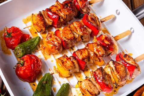 Marinated kebabs with meat and vegetables
