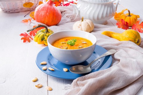 Healthy pumpkin soup with ginger carrots and coconut milk