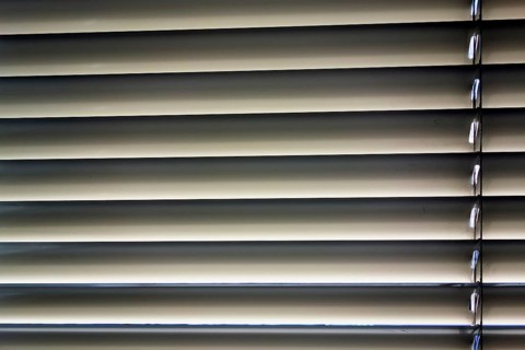 Blinds are fitted to a window to protect against heat and sun. Austria