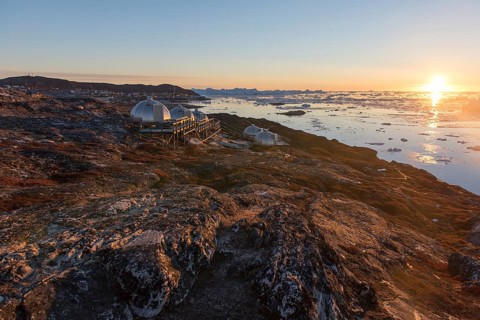 Hotel Arctic in Ilulissat with igloo rooms at sunset, Ilulissat, Greenland