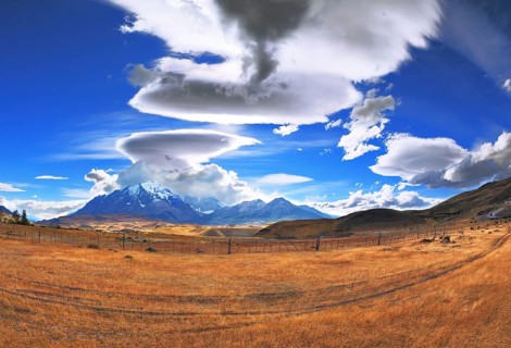 The Chile National Park Torres del Paine. Incredible shaped clouds formed by glaciers glisten in