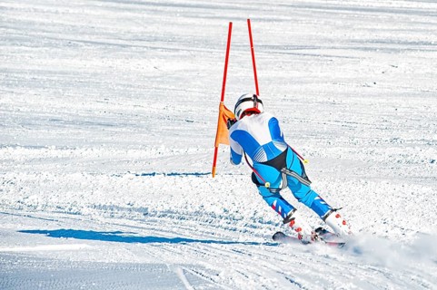 Skier on a slope in the italian alps