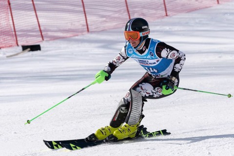 Mount skier Zhuravchenko Stepan Krasnodar Region skiing down. Russian Alpine Skiing Championship,