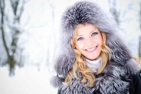 Blond woman outdoors in winter day