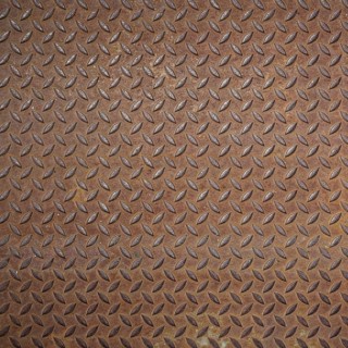 Front view of a rusty panel with non-slip surface