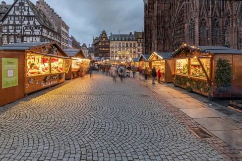 Famous Christmas market on the cathedral square in Strasbourg in Alsace. Health precautions and