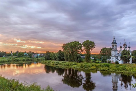 Landscape of Vologda river with Presentation of Jesus Church, Vologda, Russia. Sunset