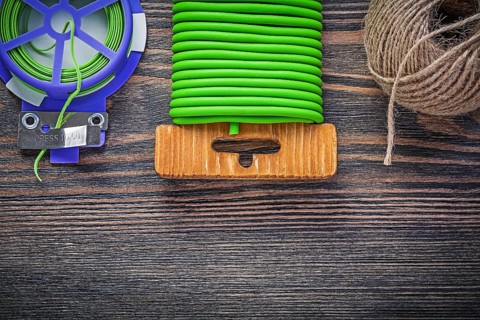 Soft wire tie skein of rope on wooden board agriculture concept