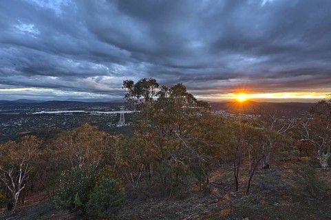 Canberra at night from Mount Ainslie Lookout and with the setting sun