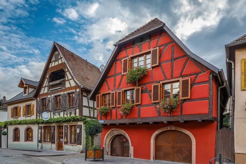 Street with historical houses in Ribeauville, Alsace, France