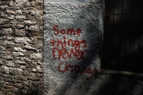 Writing on the wall of the building in Gjirokaster, Albania