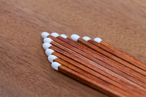 Detail of luxury matches on the wooden desk