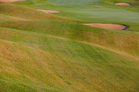 Summer golf course with different bunkers