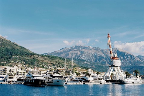 Crane on a platform near the marina in Porto. Montenegro.