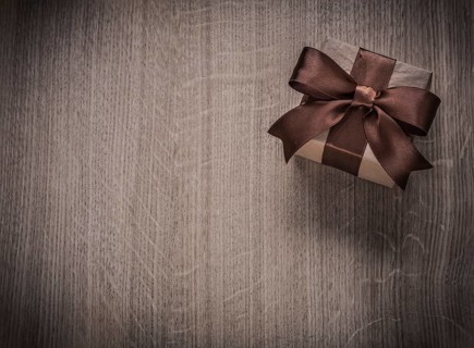 Vintage gift box on wooden board holiday concept