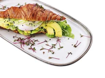 food still-life, Croissant benedict salmon with poched egg, served with fresh salad