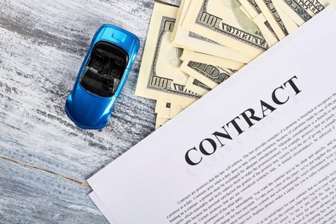 Car documents and currency. Conclusion of purchase agreement