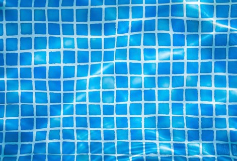 Vacation Abstract Background Of Water Ripples Over Swimming Pool Tiles