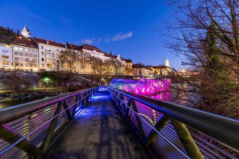 Illuminated stairway to the Murinsel, Graz, Styria, Austria