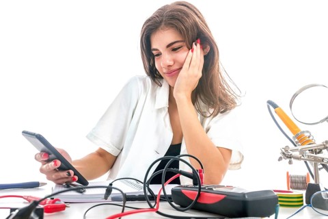 Woman Repairing Computer Part, Service Center, Electronics Repair Service