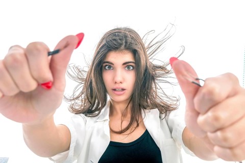 Girl having Electric Shock, electricity problems, Girl holds bare wires