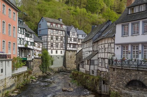 Picturesque houses along the Rur River in the historic center of Monschau, Germany