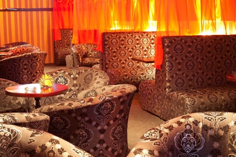 Restaurant interior (oriental style) - soft sofas and armchairs