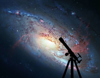 Space background with silhouette of telescope. Spiral Galaxy M106, in the constellation Canes