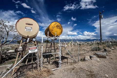 Truck stop with oil barrels and a fence of deer antlers, Highway 50, Loneliest Road in America,