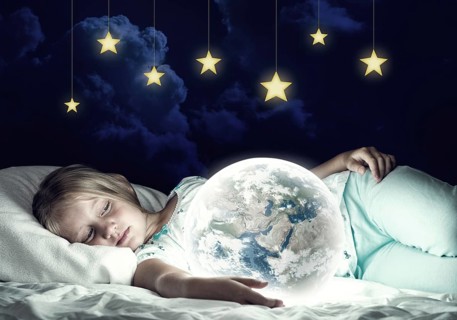 Cute girl in bed and looking at Earth planet. Elements of this image are furnished by NASA