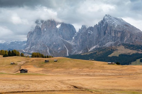 Landscape with beautiful autumn meadow field and the amazing Dolomite rocky peaks the valley of