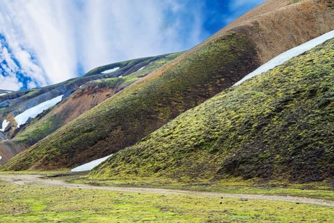 Amazing Iceland - dream for photographers and tourists. Rhyolite mountains, remains of last year's