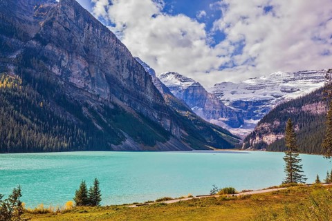 Magnificent Lake Louise is surrounded by mountain and glaciers. Rocky Mountains, Canada, Banff