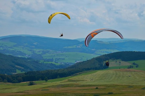 Hang glider at the Wasserkuppe, Rhön Biosphere Reserve, Heß