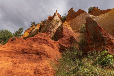 Red ocher cliff in the Luberon in Provence. Roussilon, Vaucluse, France