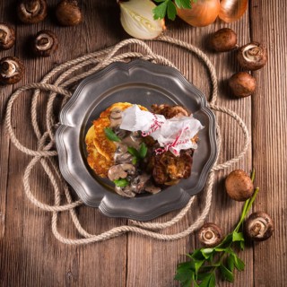 Grilled ribs with potato pancakes