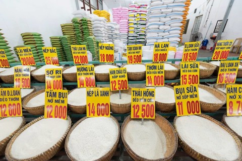 Different sorts of rice in baskets with prices, Vietnam