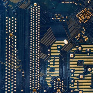 Detail of the back of a motherboard. Circuits and welds