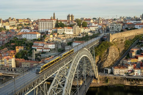 Porto City, Douro River and Dom Luis Bridge I with Tram in Morning. View from Tourist Viewpoint