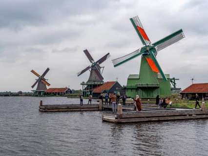 Traditional windmills on the coast Zaan in museum village, Open-air museum Zaanse Schans, Zaanse