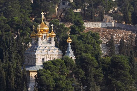 Golden domes of the Church of Mary Magdalene and cypresses. Mount of Olives, Jerusalem