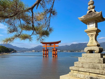 Stone lamp at the seaside close to Floating Torii gate, Hatsukaichi, Hiroshima, Japan
