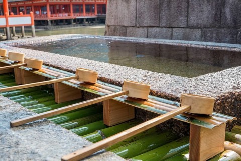 Chozuya with bamboo spoons for ritual purification in the temple