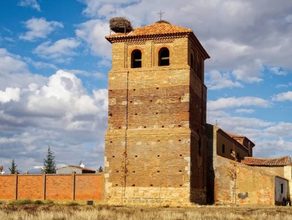 Stork nest on the bell tower of the Church of San Bartolome, Calzadilla de los Hermanillos, Castile