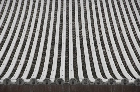 Detail of a japanese roof with traditional roofing tiles, Kyoto, Japan