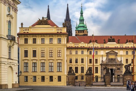 View of enter in Prague castle with St. Vitus Cathedral tower, Czech republic