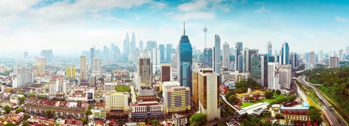 Panorama cityscape view in the middle of Kuala Lumpur city center, early morning with little mist,